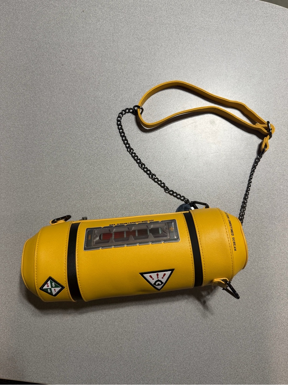 Disney Pixar Monsters Inc Scream Canister
Crossbody Bag Yellow